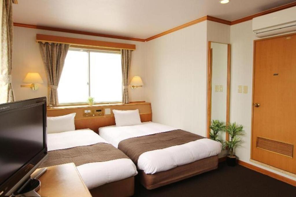 Hotel Livemax Budget Naha Tomarikou Exterior foto